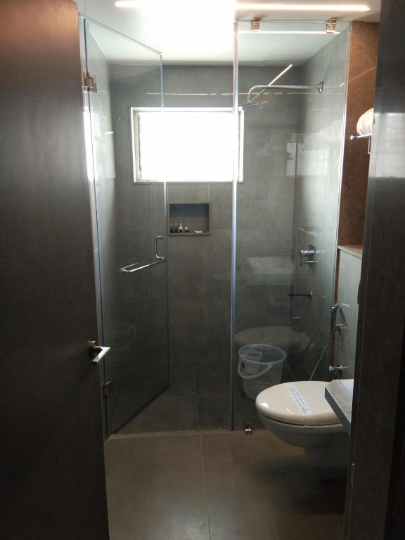 Koupelna v ubytování RATHNA RESIDENCY