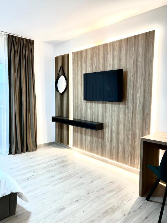 TV a/nebo společenská místnost v ubytování Riverside ApartHotel by InnTime
