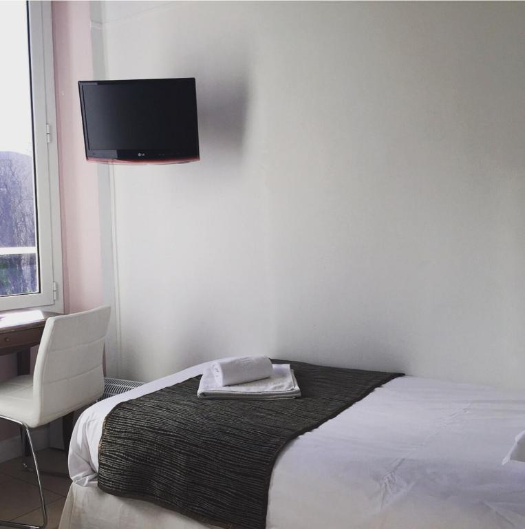 Postel nebo postele na pokoji v ubytování Hotel Danemark