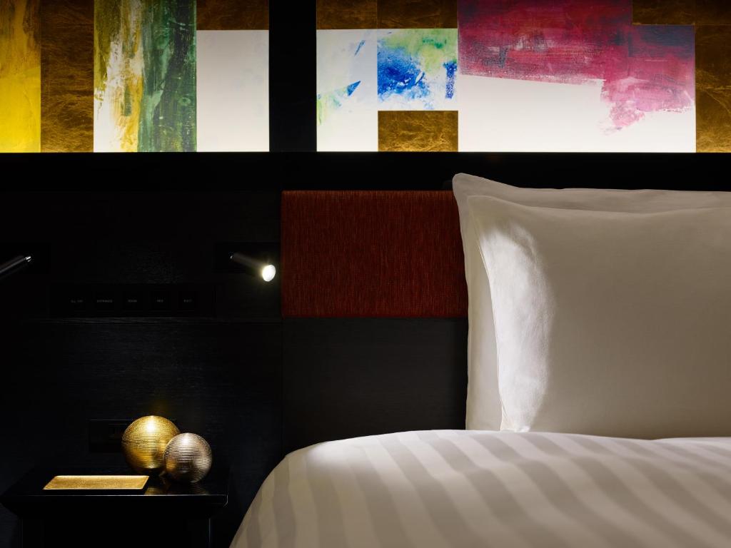 Postel nebo postele na pokoji v ubytování Mitsui Garden Hotel Kanazawa