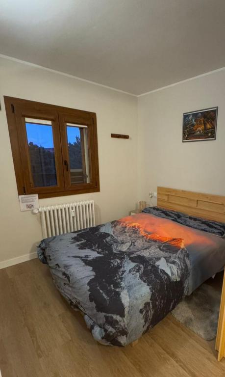 Postel nebo postele na pokoji v ubytování La Molina - acogedor apartamento cerca de las pistas de esquí
