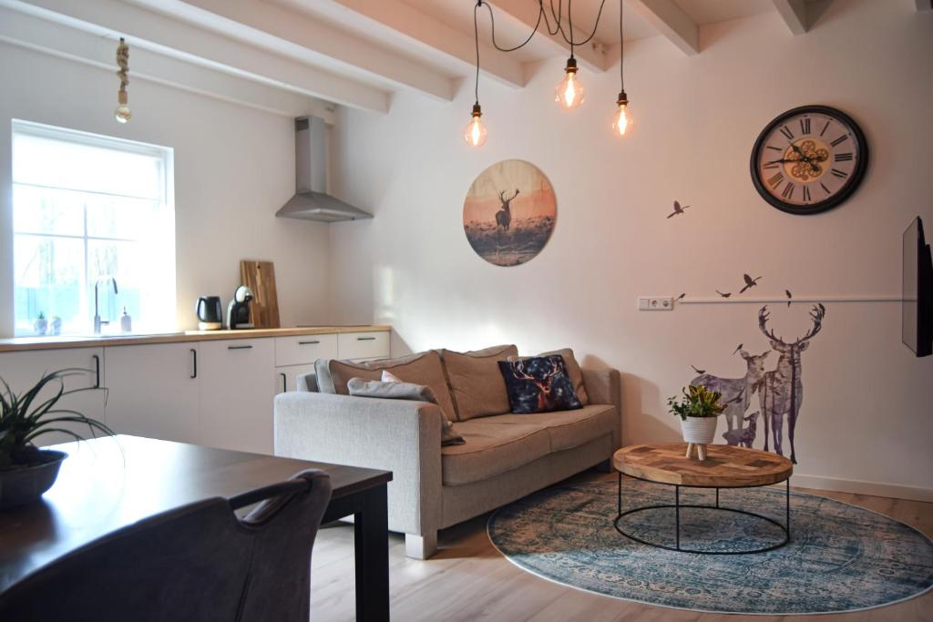 Χώρος καθιστικού στο Het Rustend Hert