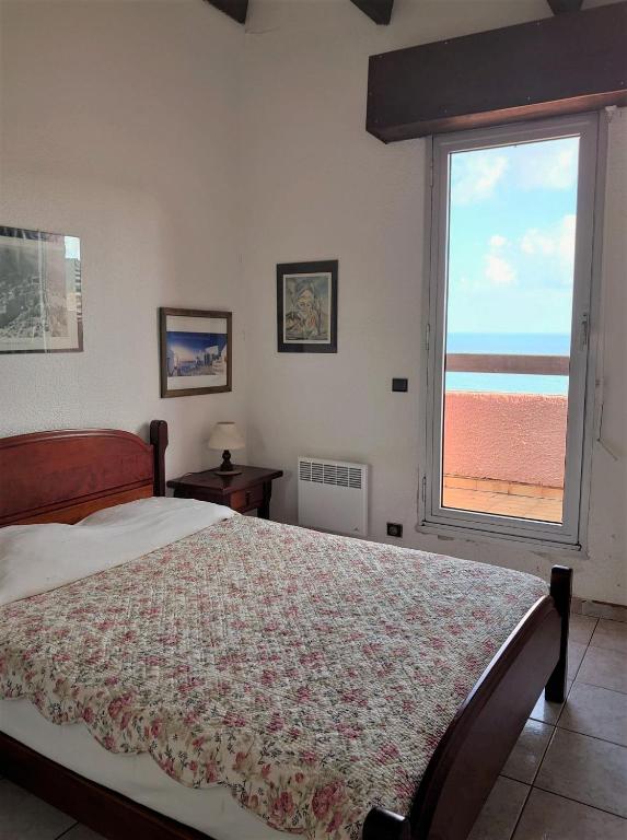 Posteľ alebo postele v izbe v ubytovaní 6OLI142 Appartement T3 duplex vue mer