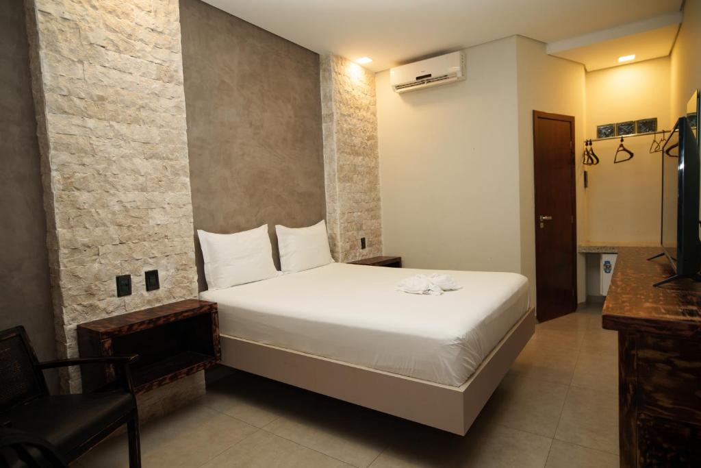 Postel nebo postele na pokoji v ubytování W4 Hotel