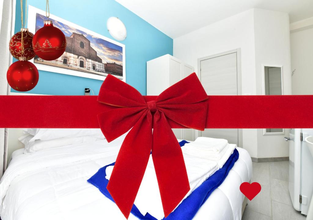 Postel nebo postele na pokoji v ubytování A San Lazzaro Rooms