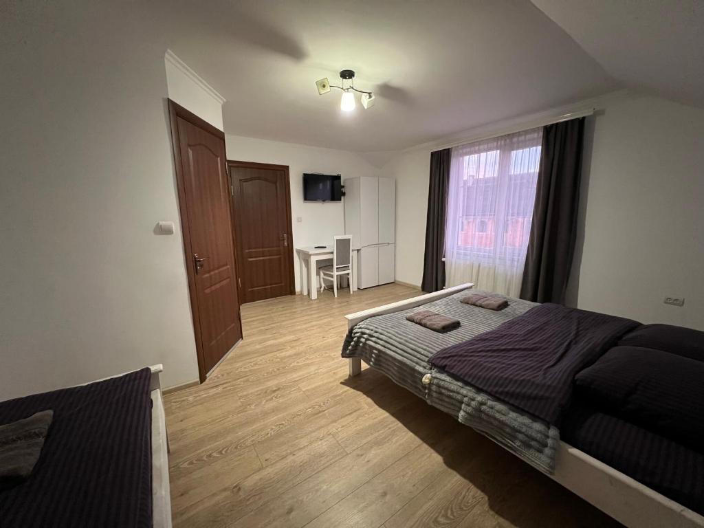 Postel nebo postele na pokoji v ubytování Harmony