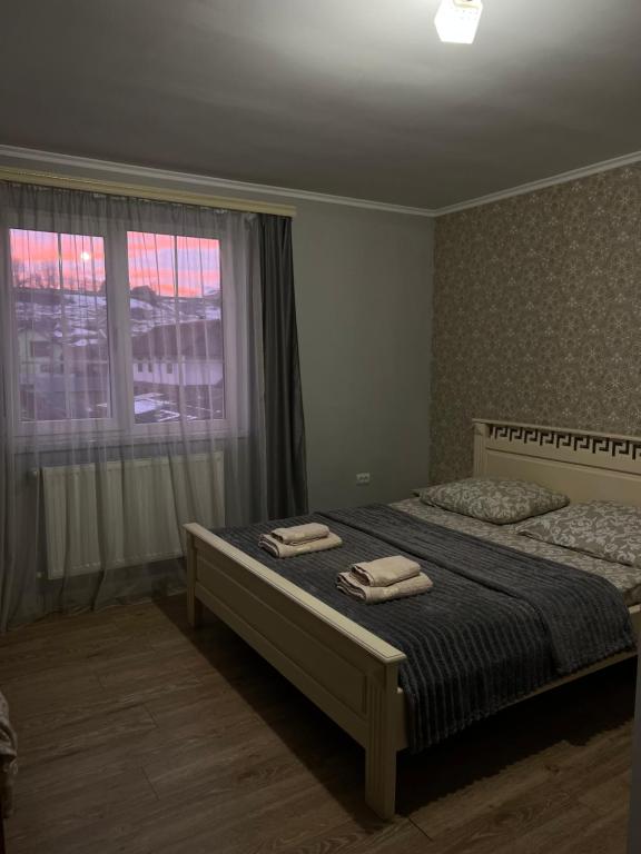 Postel nebo postele na pokoji v ubytování Harmony