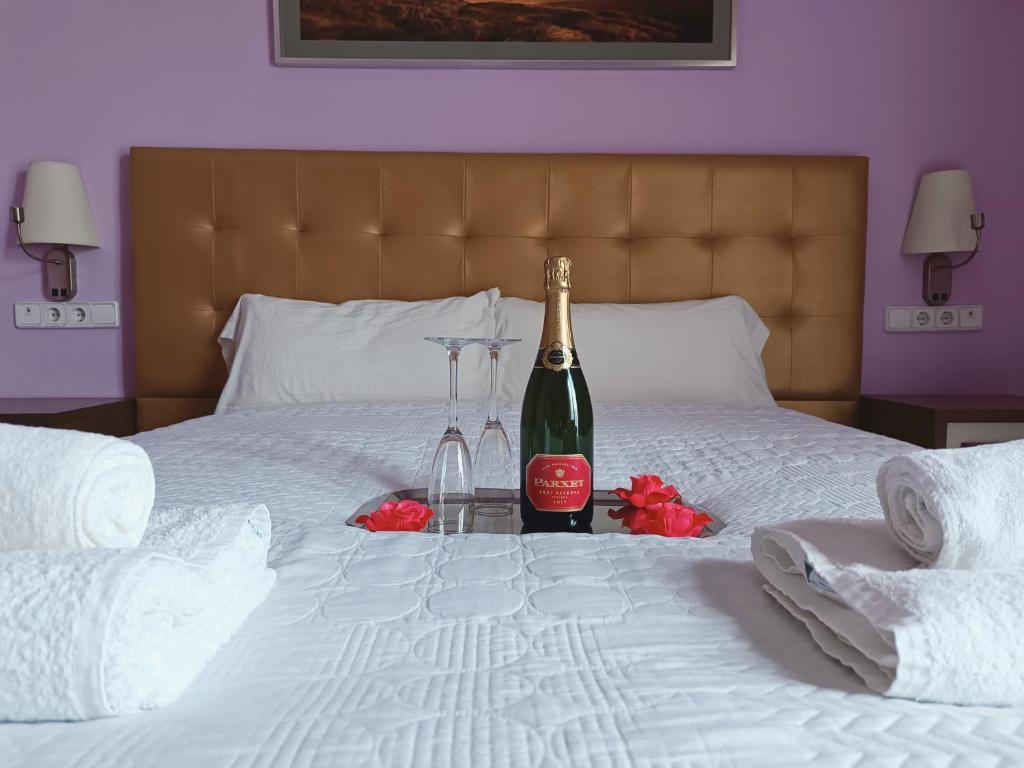 Postel nebo postele na pokoji v ubytování Hotel Llar de Capitans