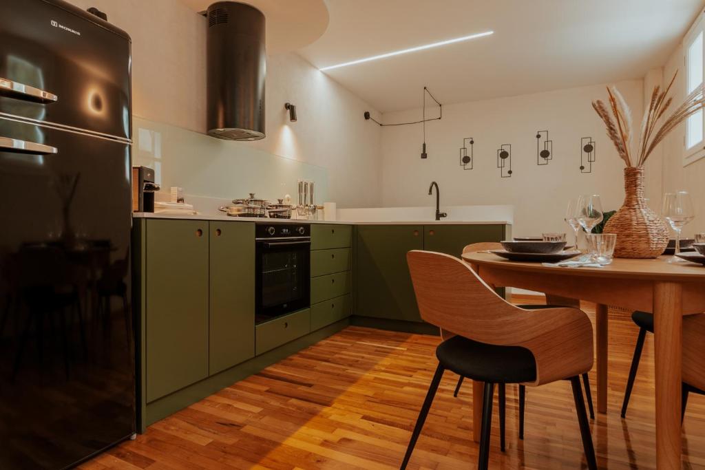 Kuchyň nebo kuchyňský kout v ubytování Clocktower Nafplio Suite