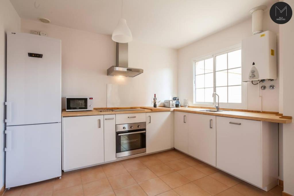 Kuchyň nebo kuchyňský kout v ubytování Villa Marquesado