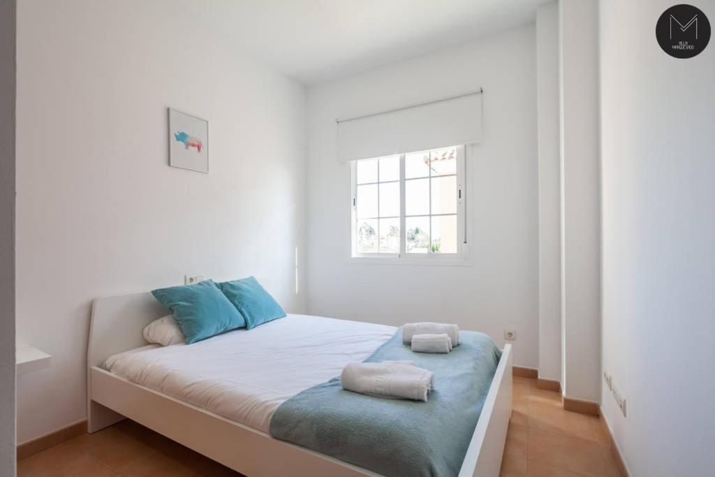 Postel nebo postele na pokoji v ubytování Villa Marquesado