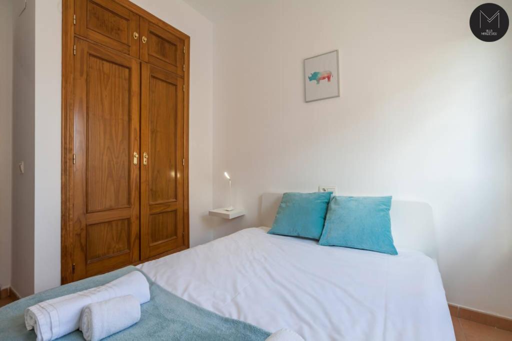Postel nebo postele na pokoji v ubytování Villa Marquesado