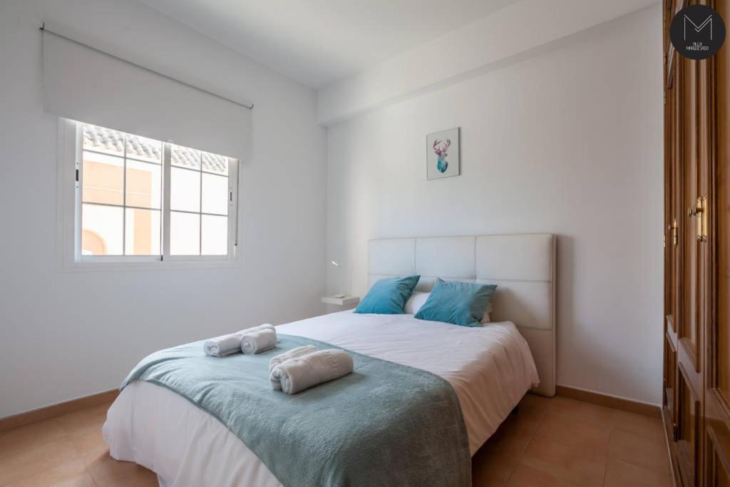 Postel nebo postele na pokoji v ubytování Villa Marquesado