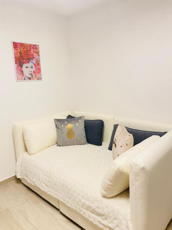 Postel nebo postele na pokoji v ubytování Sandrina - Studio lumineux et rénové
