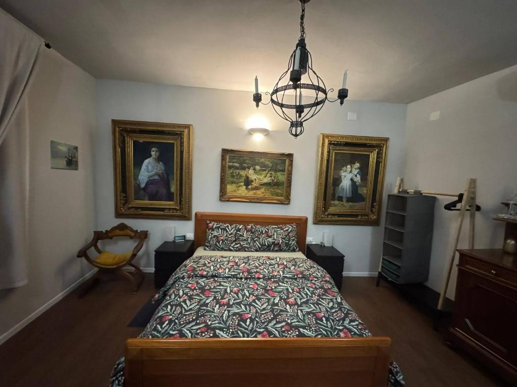 Postel nebo postele na pokoji v ubytování Palazzo Adalgisa