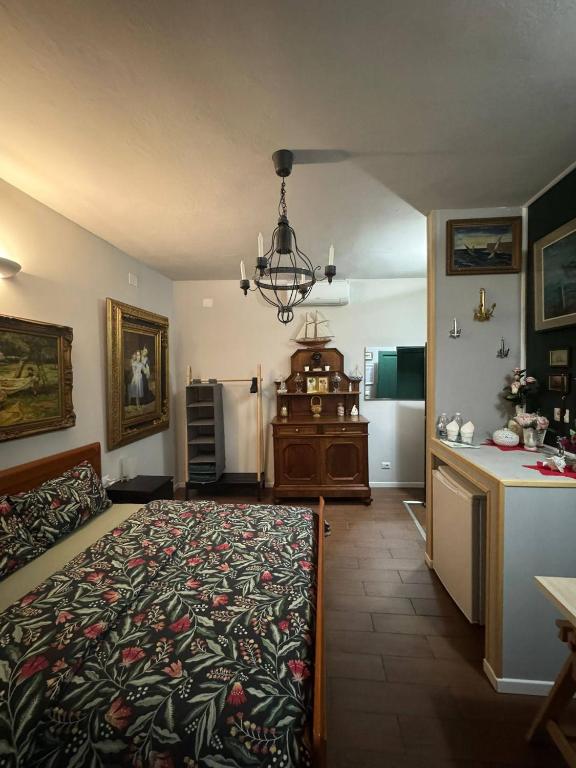 Postel nebo postele na pokoji v ubytování Palazzo Adalgisa