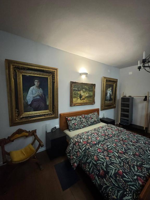 Postel nebo postele na pokoji v ubytování Palazzo Adalgisa