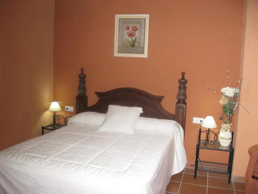 Postel nebo postele na pokoji v ubytování Hotel San Julian