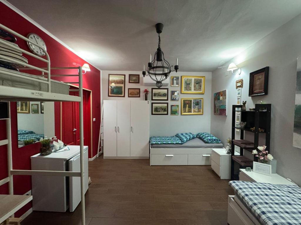 Postel nebo postele na pokoji v ubytování Palazzo Adalgisa