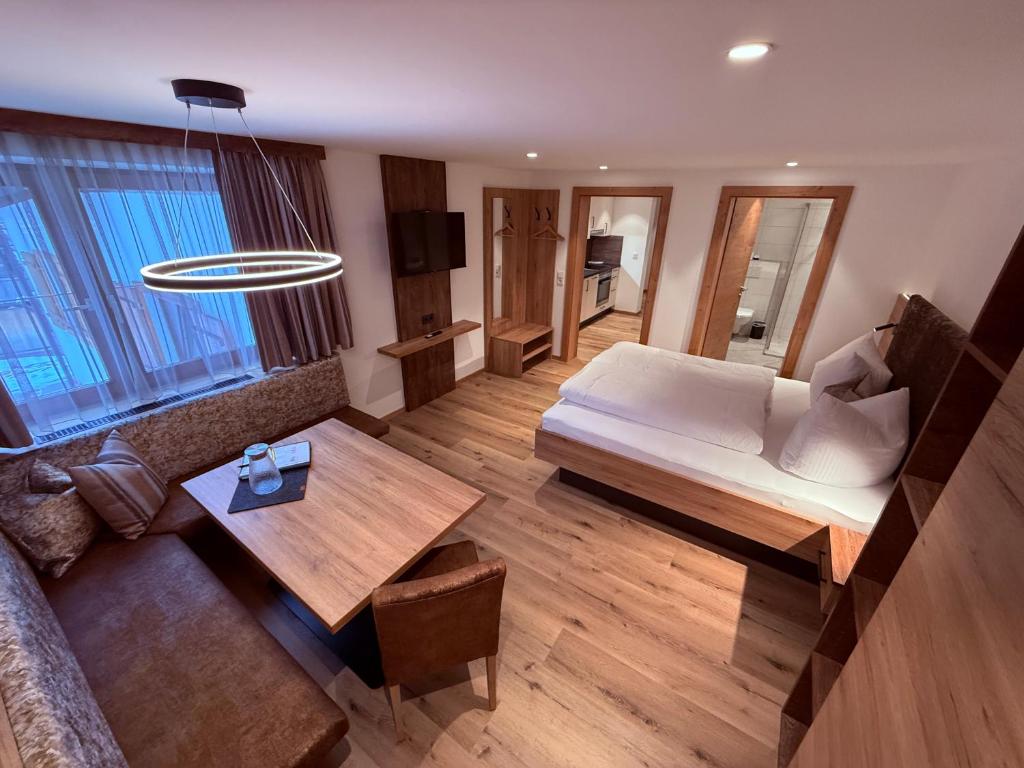 Postel nebo postele na pokoji v ubytování Marlis Apartments