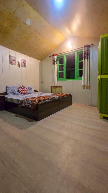 Postel nebo postele na pokoji v ubytování The City Escape Farmstay