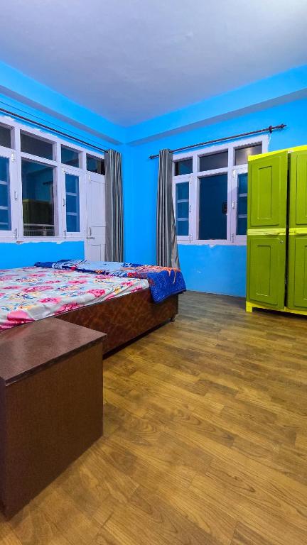 Postel nebo postele na pokoji v ubytování The City Escape Farmstay