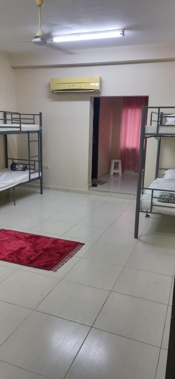Postel nebo postele na pokoji v ubytování Muscat Galaxy Hostel