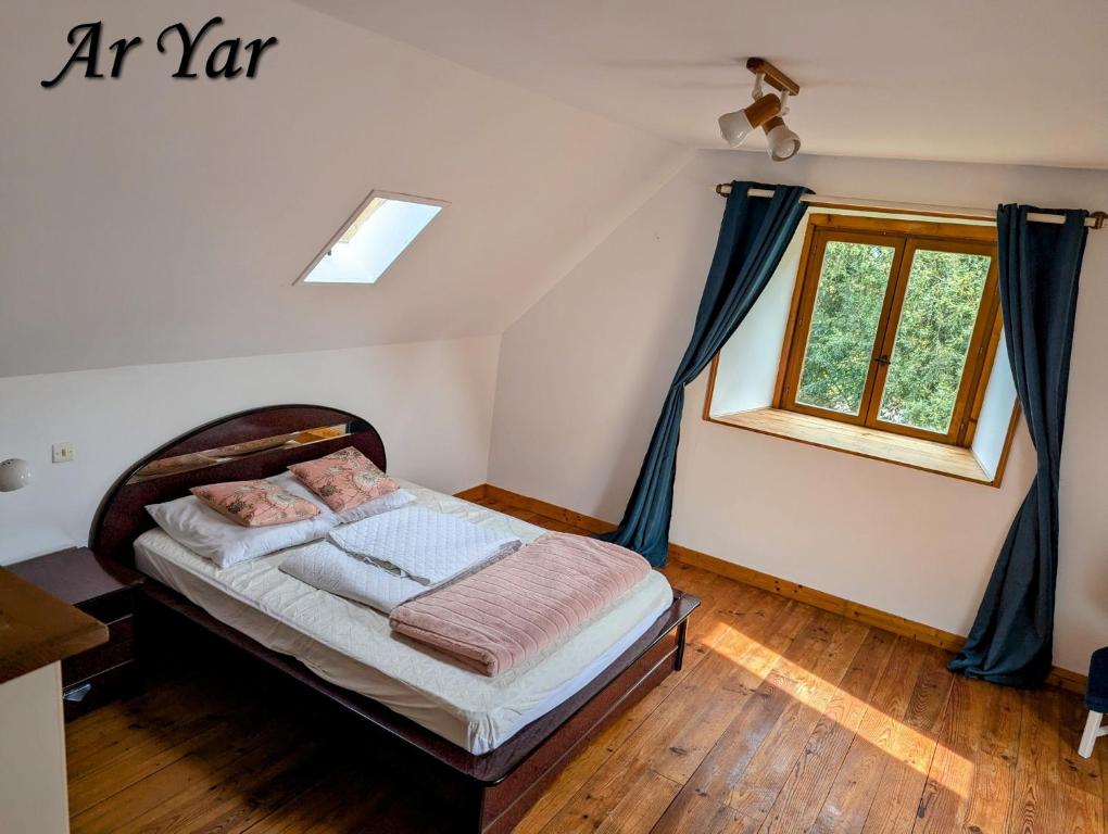Postel nebo postele na pokoji v ubytování Ker Gwenn
