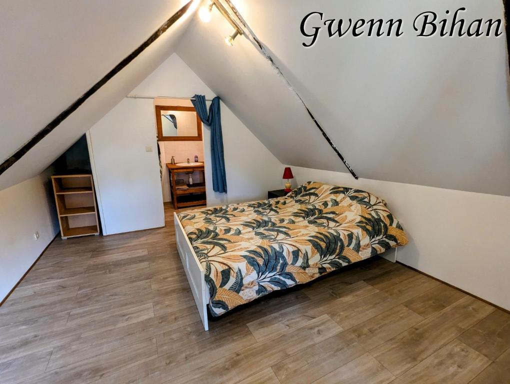 Postel nebo postele na pokoji v ubytování Ker Gwenn