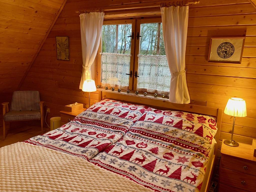 Postel nebo postele na pokoji v ubytování Sznureczki