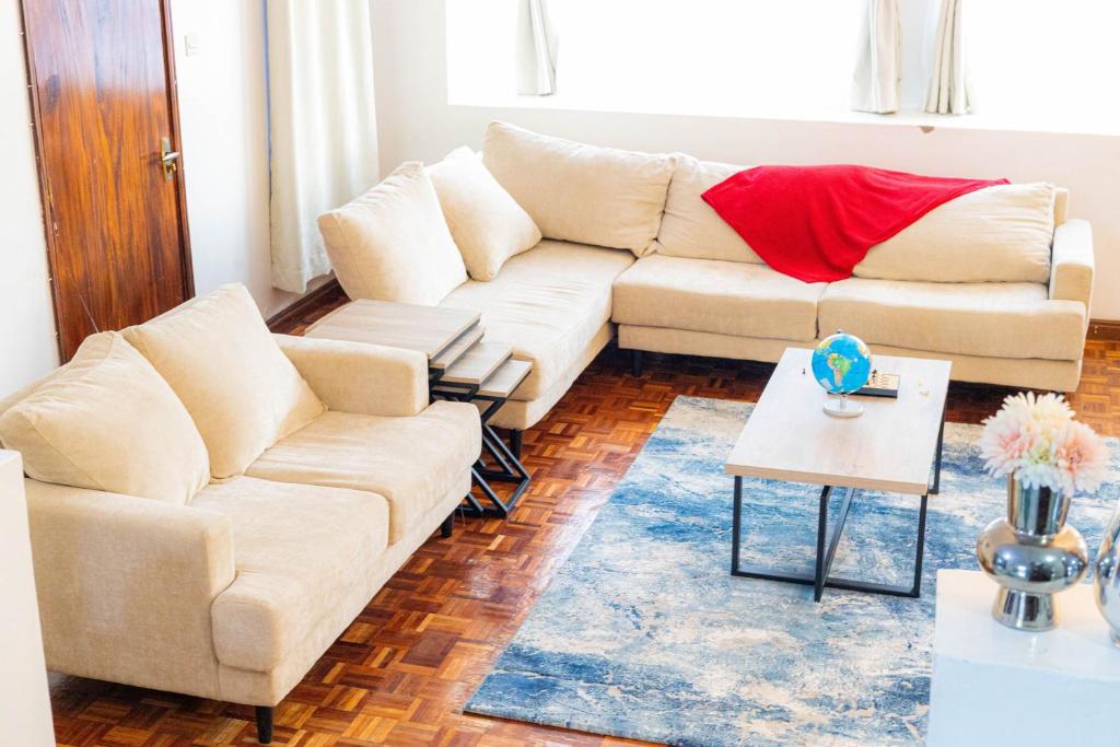 Posezení v ubytování Milimani Guesthouse