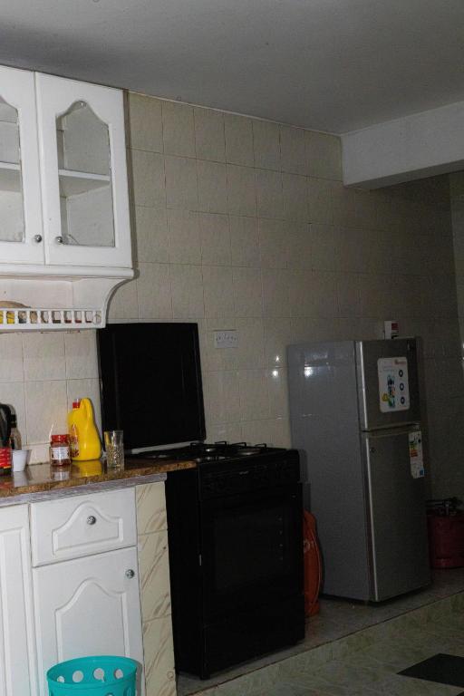 Kuchyň nebo kuchyňský kout v ubytování Milimani Guesthouse