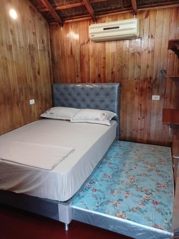 Postel nebo postele na pokoji v ubytování Cabañas Compartidas en Casa Quinta en Itá
