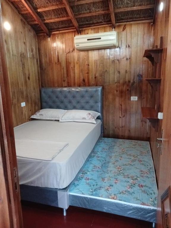 Postel nebo postele na pokoji v ubytování Cabañas Compartidas en Casa Quinta en Itá