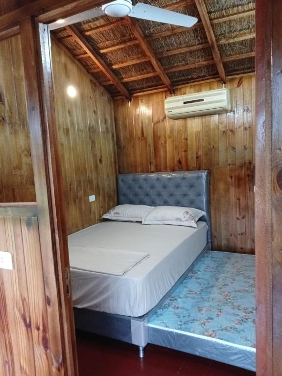 Postel nebo postele na pokoji v ubytování Cabañas Compartidas en Casa Quinta en Itá
