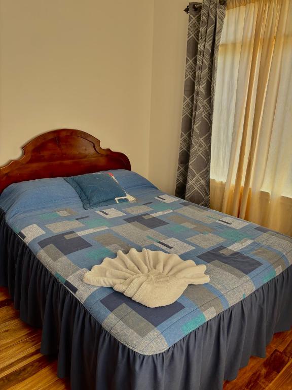 Postel nebo postele na pokoji v ubytování Monteverde Ecolodge