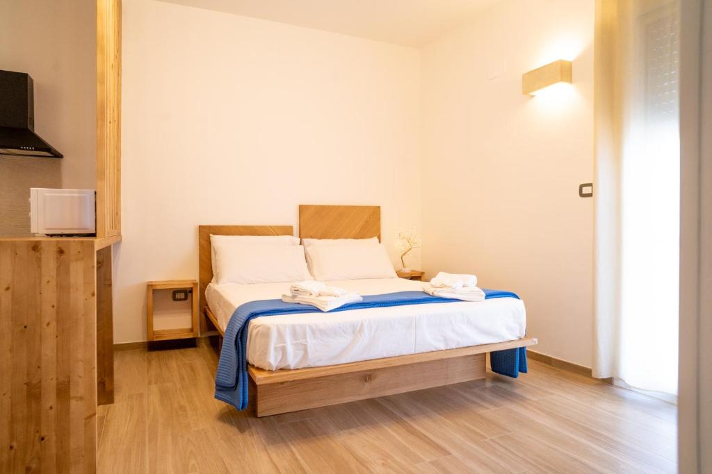 Postel nebo postele na pokoji v ubytování Pietra Bianca