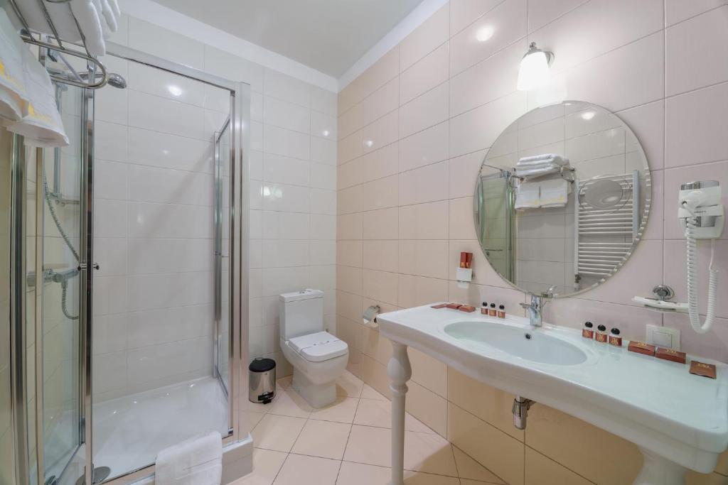 Koupelna v ubytování Alarus Luxe Hotel