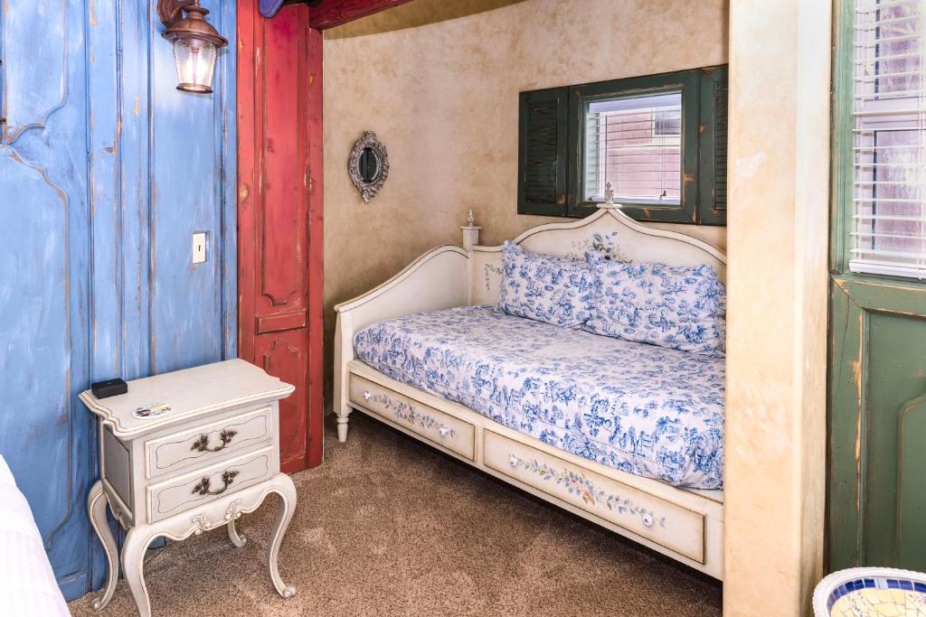 Postel nebo postele na pokoji v ubytování Adobe Grand Villas