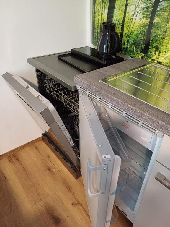 Kuchyň nebo kuchyňský kout v ubytování Appartements Dorner, Semmering