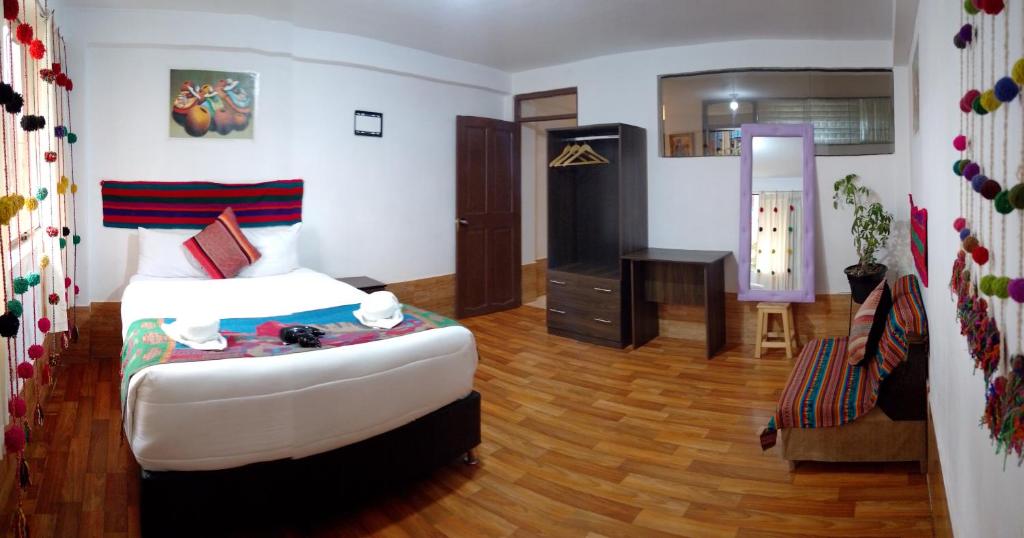 Postel nebo postele na pokoji v ubytování Inca Town In