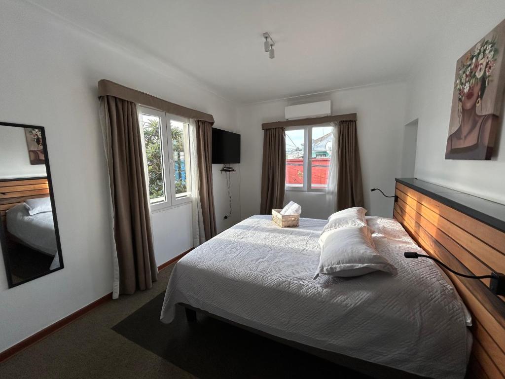 Postel nebo postele na pokoji v ubytování Casona Italia B & B