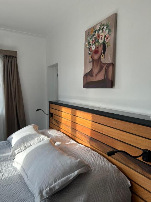 Postel nebo postele na pokoji v ubytování Casona Italia B & B