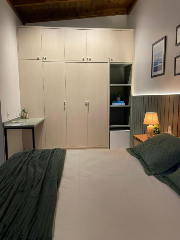Postel nebo postele na pokoji v ubytování Pousada Casa Mariscal