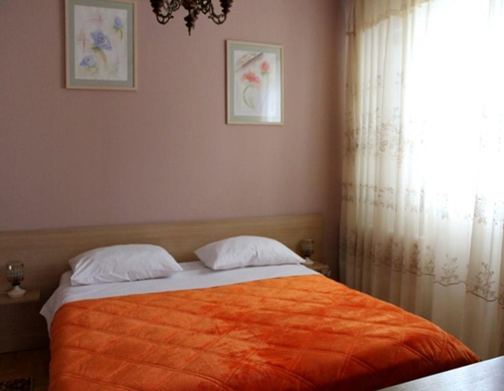 Posteľ alebo postele v izbe v ubytovaní Apartments Boris