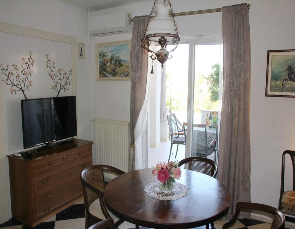 Televízia a/alebo spoločenská miestnosť v ubytovaní Apartments Boris