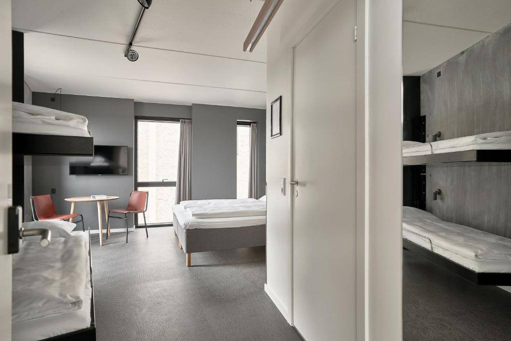 Postel nebo postele na pokoji v ubytování Four Points Flex by Sheraton Copenhagen Arena