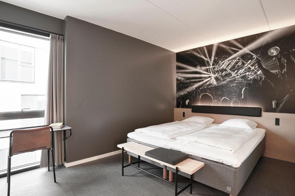 Postel nebo postele na pokoji v ubytování Four Points Flex by Sheraton Copenhagen Arena