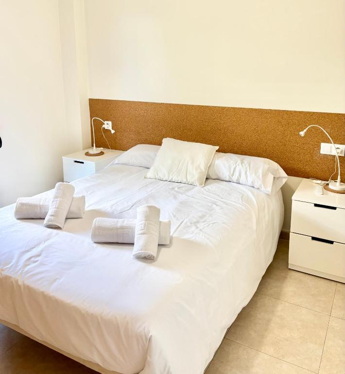 Postel nebo postele na pokoji v ubytování Sun & Sea Daimus