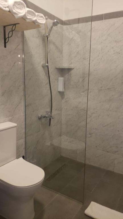 Koupelna v ubytování Hotel Antigone